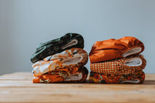 Load image into Gallery viewer, Walk Full Collection Of Cloth Nappies Stacked in Threes