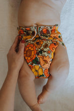 Load image into Gallery viewer, Baby Wearing Blooming gorgeous Cloth Nappy Design Front View
